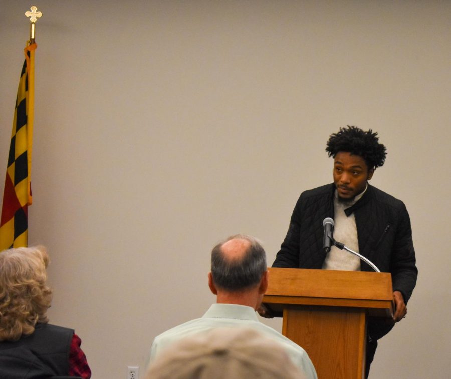 Third-year psychology student Tevin Paige speaks at a ceremony honoring veterans at AACC. 