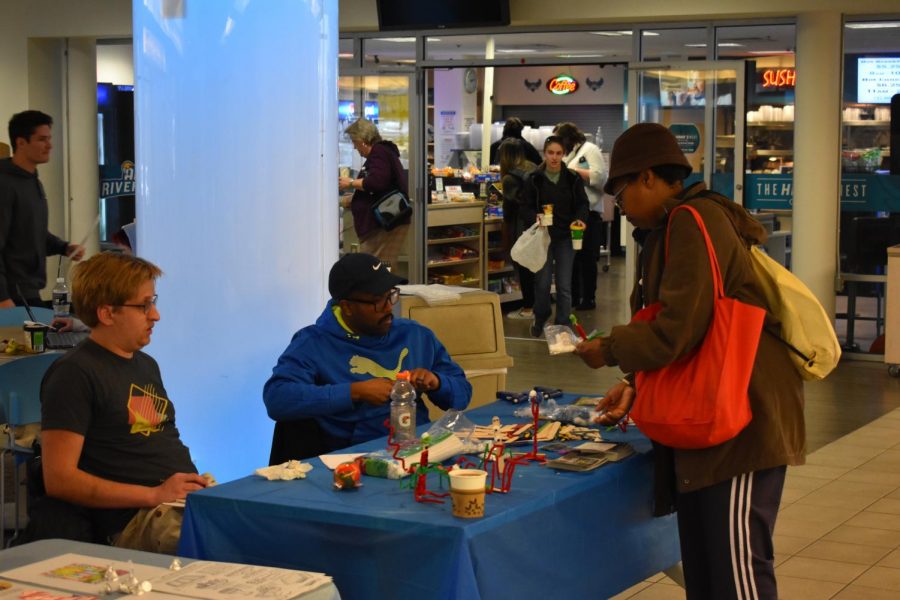 Students celebrate the holidays at an event with craft stations, hot cocoa, gingerbread house building and more.