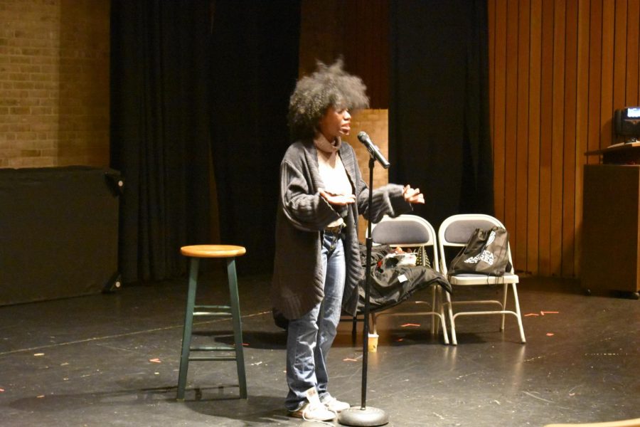 Mecca Verdell, a slam poet from Baltimore, reads poetry at the final coffeehouse of the semester, hosted by the AACC literary magazine Amaranth and the Campus Activities Board.