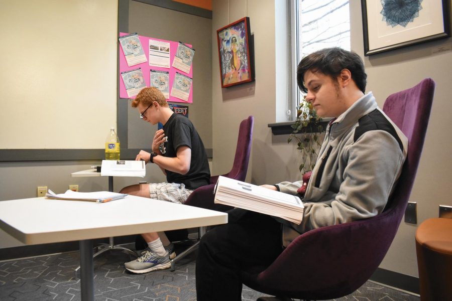 First-year undecided student Ryan Barthelemy, left, and second-year sociology student Joseph Giddings prepare for finals.