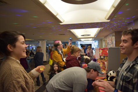 Students try different Asian cultural foods during the Lunar New Year event.