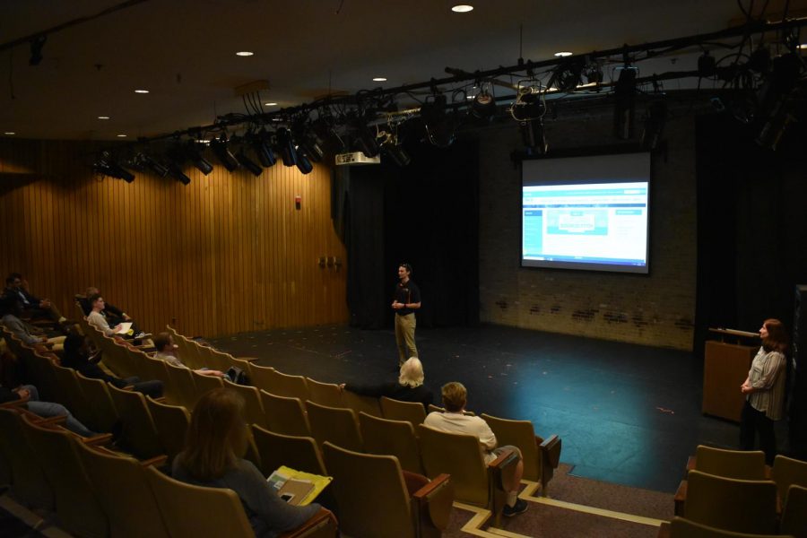 Seventh-year business management student Dalton Leonard addresses the crowd.