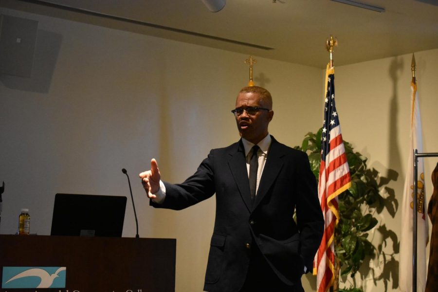 Darrick Johnson performs as Malcolm X