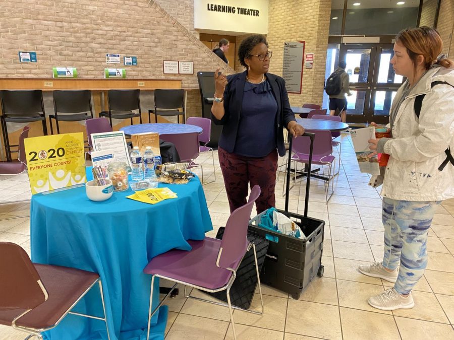 Director of the Student Achievement and Success Program Janice Watley informs second-year psychology student Bella Hahn about the 2020 census.  