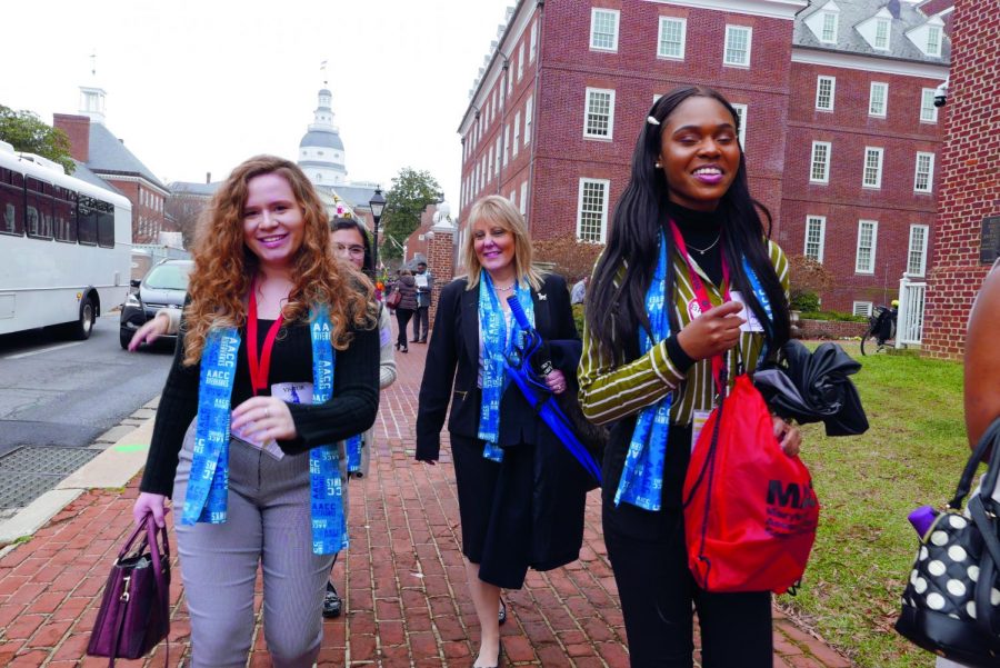 Students join President Dawn Lindsay (center) to meet with state legislators to discuss upcoming bills.