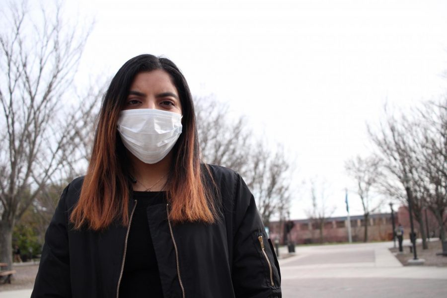 Lindsey Gonzalez, a third-year transfer studies student, wears a surgical mask on AACCs campus in 2020. Campus Current ran this photo with the first article it published about the coronavirus.