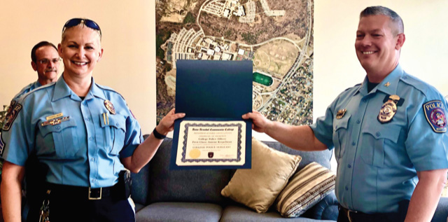 Sgt. Janene Kerpelman, left, is the first AACC police officer promoted to sergeant. 