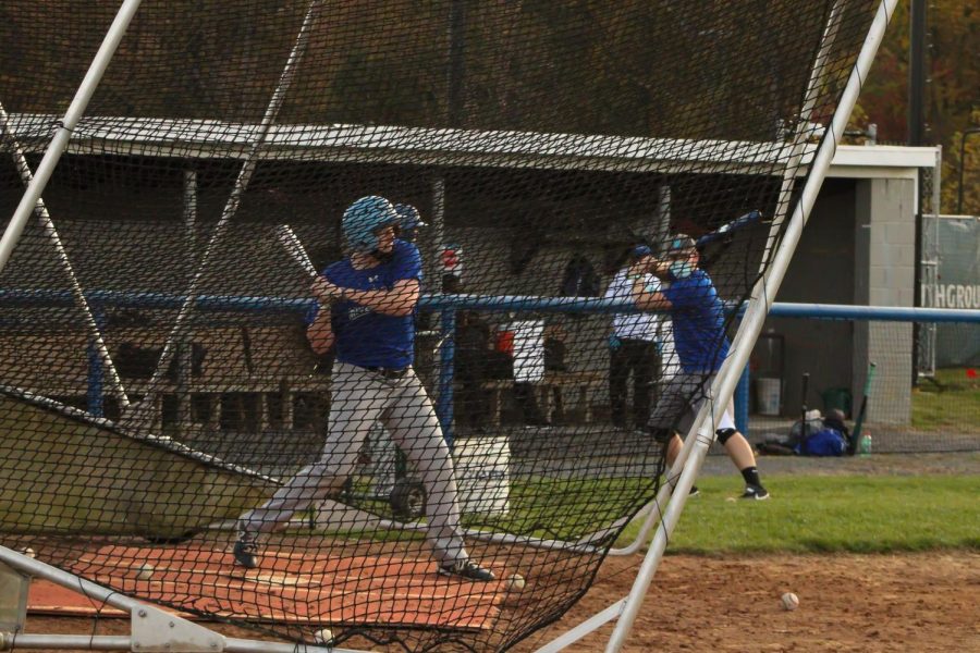 Baseball players practice on campus  this week for the first time since the college closed in March.