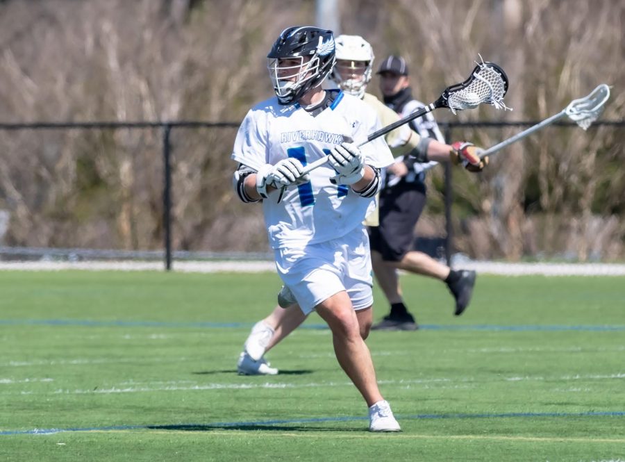 The men's lacrosse team finishes its season with a loss to CCBC Essex after being selected for an at-large berth to the national championship tournament. Pictured, defenseman Sam Weisshaar, a second-year transfer studies student.