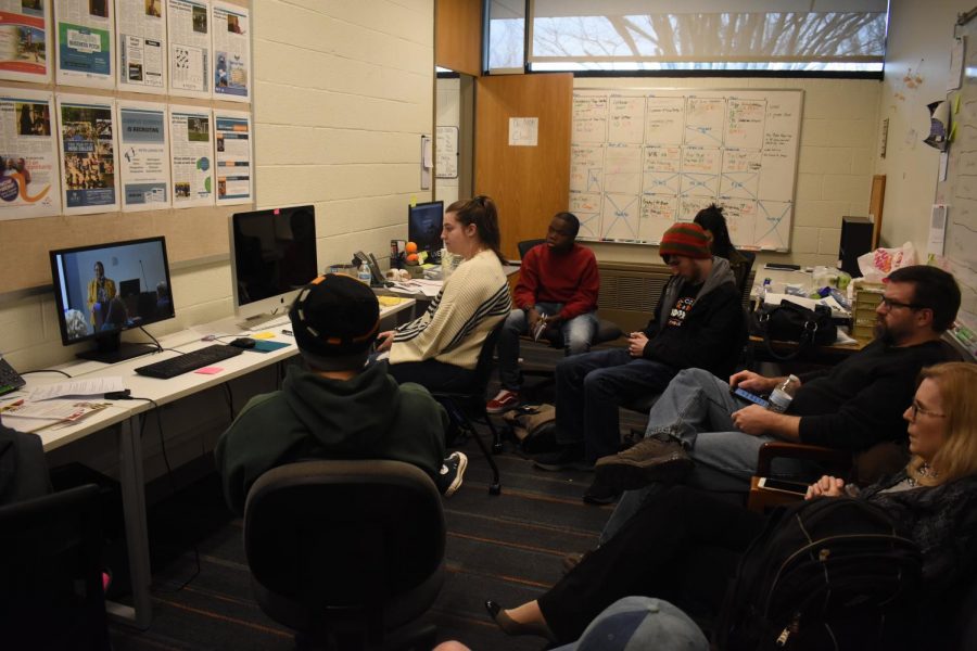 Campus Current staff members sit in their newsroom to watch as the colleges vice presidents explain their plan to shut down the campus in March 2020. The student journalists lost the newsroom, located in the Humanities building, to a ventilation issue this semester.