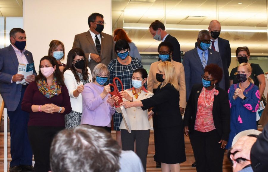 College and community officials gather at the new Health and Life Sciences building for a grand opening ceremony.