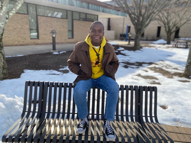 Christian Richey posing in the Quad.