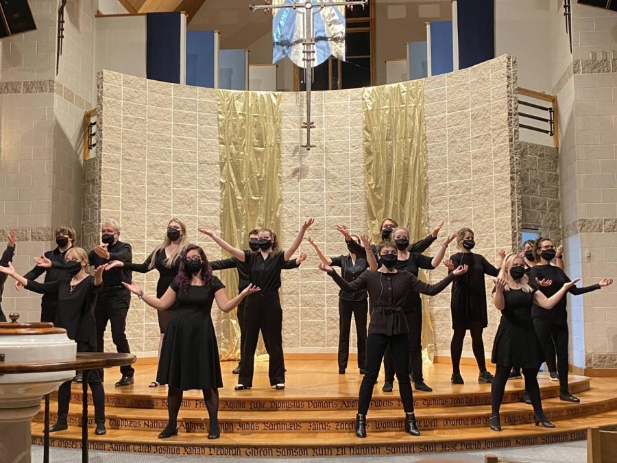 The AACC Chamber Singers perform while wearing masks.