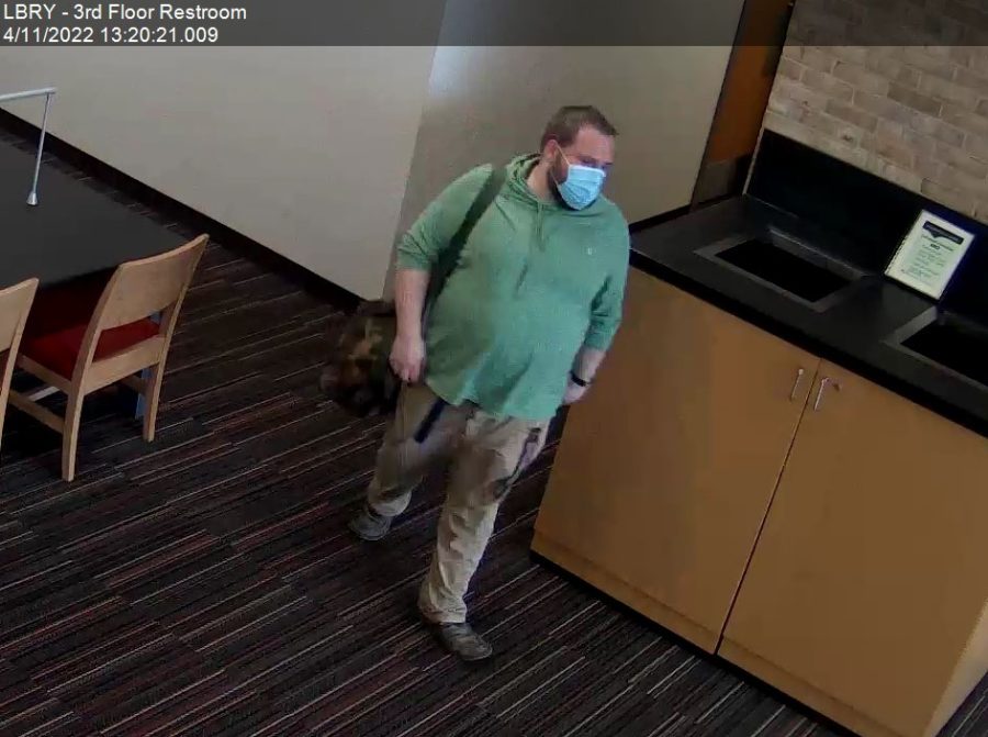 Campus police released this photo of man they suspect is taking photos in campus mens rooms.