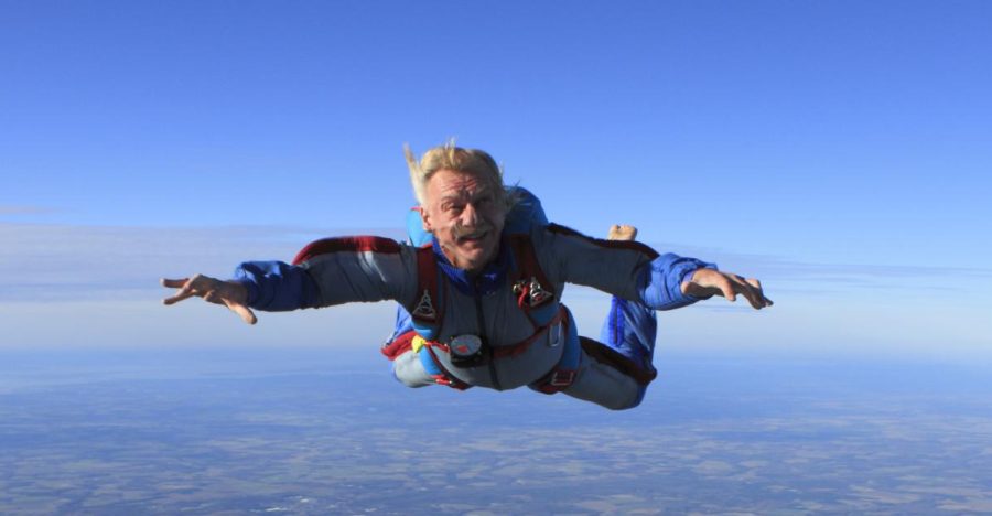 Alford Shinaberry, AACC’s mailroom supervisor, will retire on Oct. 1 after 52 years with the college. His hobbies include skydiving. Shown, in a jump over Laurel Delaware.