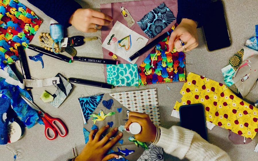 People making a quilt