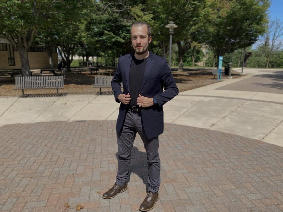 With a little effort, anyone can craft a fashionable style that’s uniquely theirs. Shown, Campus Current Editor-in-Chief Zack Buster styling on the Quad.