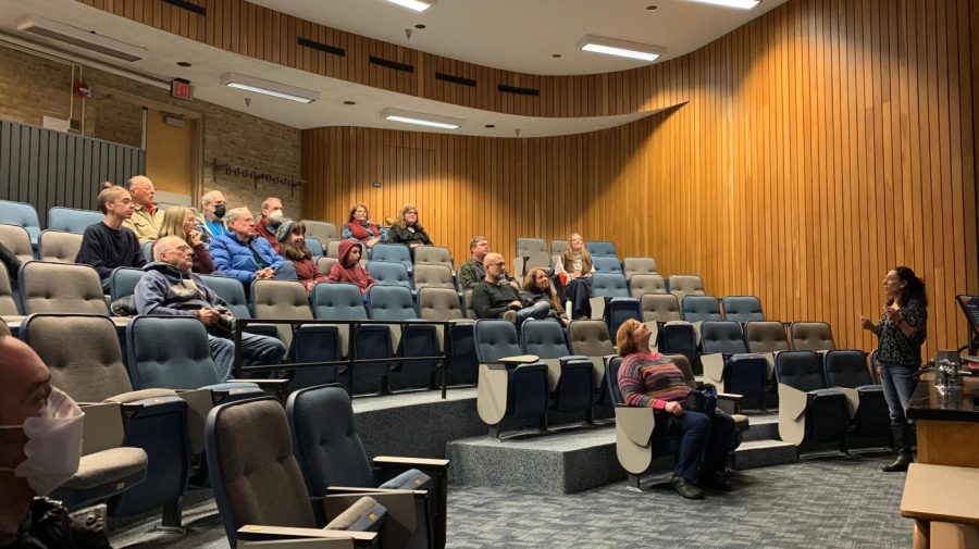 Daryl Cooke, a NASA solar system ambassador, speaks to students and faculty in the Dragun Lecture Hall during the lecture portion of a Super Science club event on Saturday. 