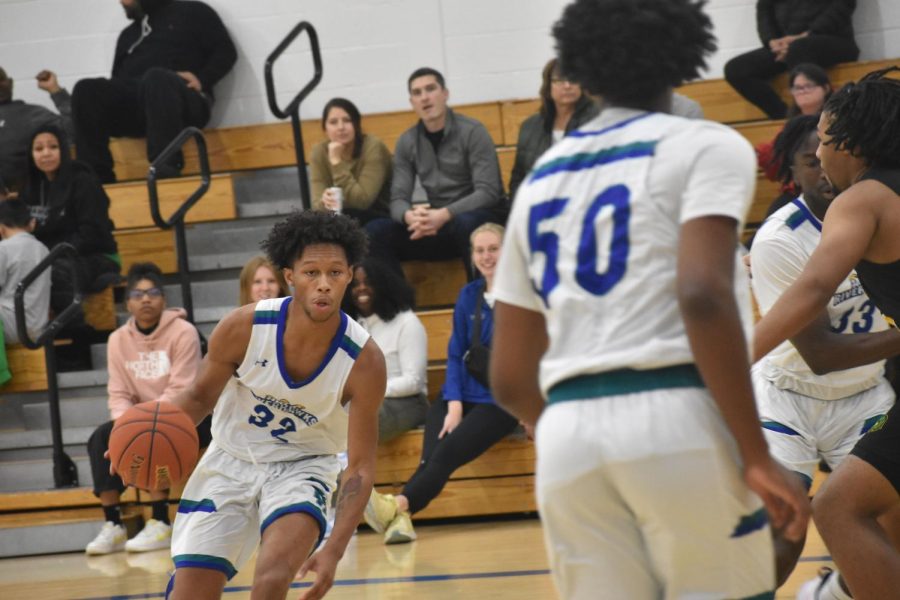 The Riverhawks men's basketball team lost 82-75 yesterday as the squad has lost its last 13 games. Guard Truth Norton (left) scored 19 points and had four rebounds. 