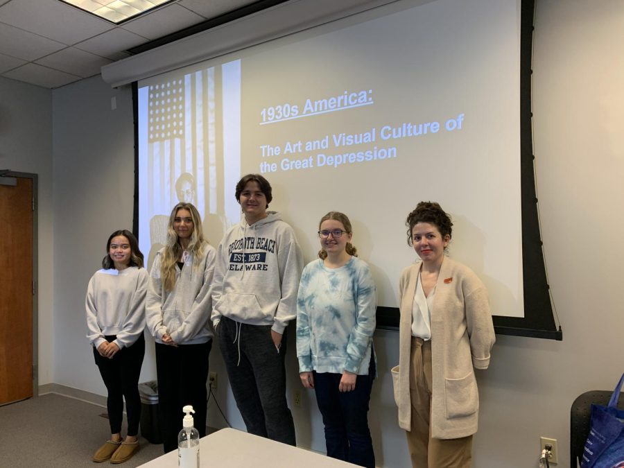 Students enrolled in a thematic learning community take two classes paired together with a common theme. Shown, professor Shana Cooperstein and her HUM 101 class, which is paired with a HIS 212 course.  
