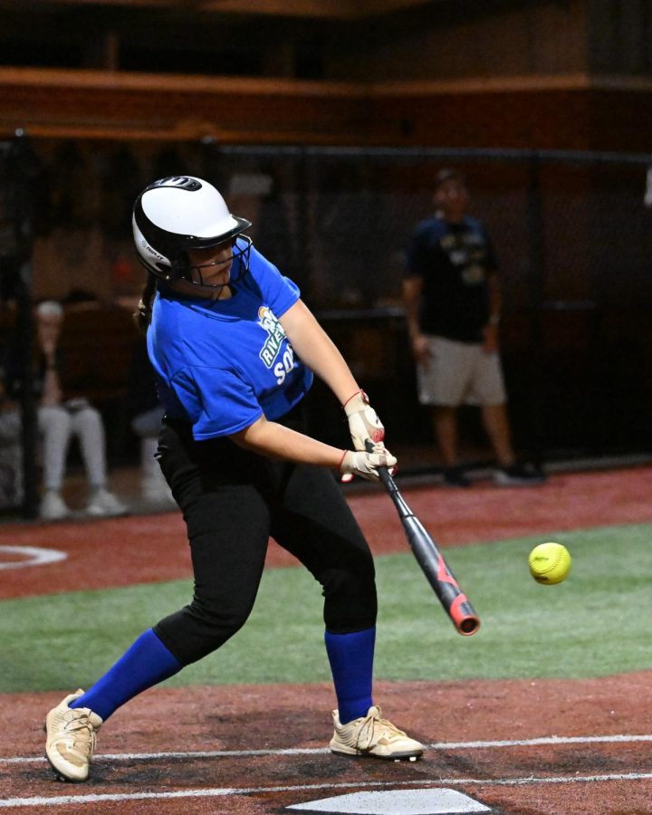 Megan Cunningham playing softball