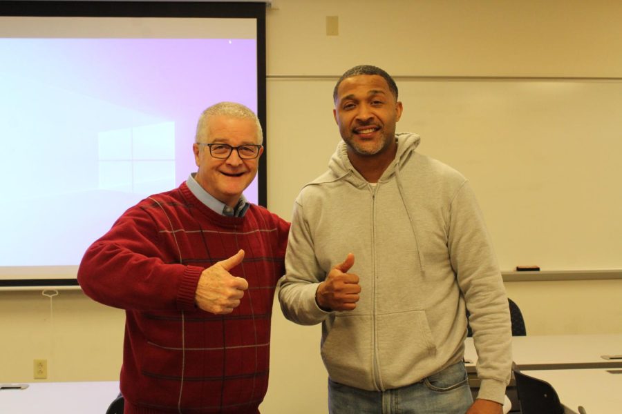 Student+entrepreneurs+pitch+their+business+ideas+every+year+in+a+Shark+Tank-style+competition+to+win+cash+prizes.+Shown%2C+mentor+Steve+Berry%2C+left%2C+poses+with+contestant+Ron+Parker+at+a+kickoff+event.