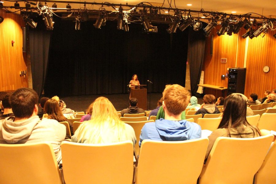 Shown, students watch author Melissa Reddish perform.