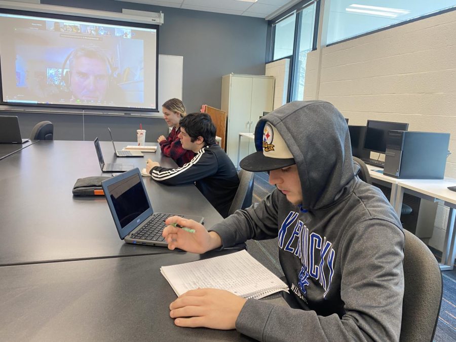 Journalism students take notes during a Zoom presentation about Judaism last week.