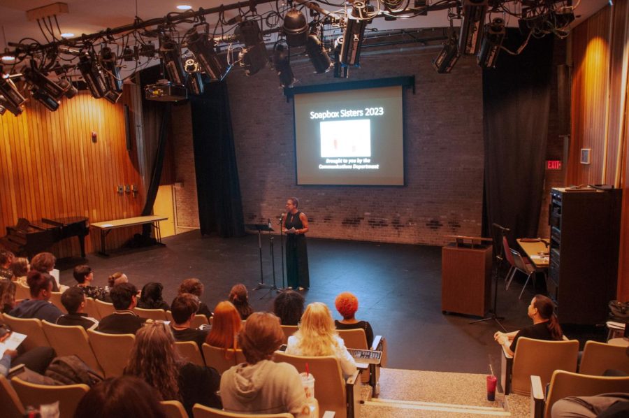 Communications professor and event organizer April Copes speaks at Soapbox Sisters on Tuesday. 