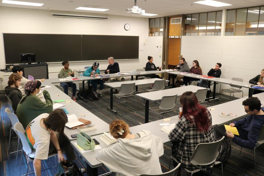 English professor Steve Canaday, center, teaches seminar-style classes through the BLAST program. 