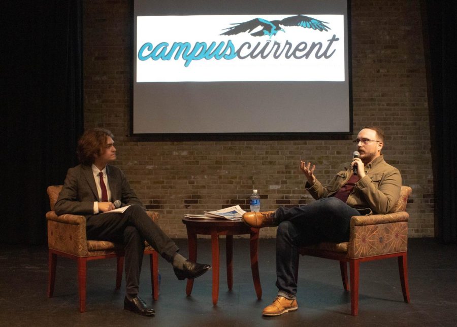 Captial+Gazette+Editor+Brooks+DuBose%2C+right%2C+speaks+to+a+crowd+of+students+and+faculty+at+a+live+interview+on+Tuesday.+