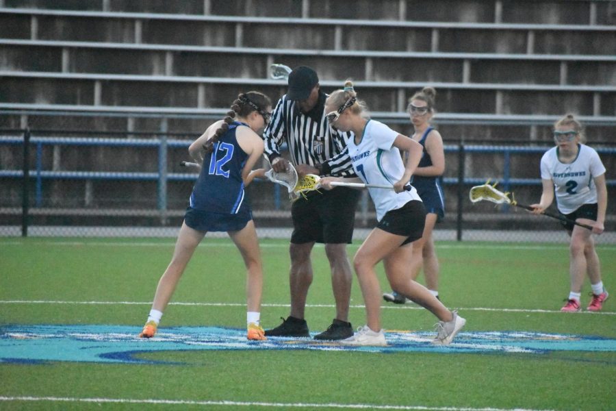 The+Riverhawks+are+National+Junior+College+Athletic+Association+district+champions+as+they+beat+the+Harford+Fighting+Owls+25-11+on+May+4.+Shown%2C+right%2C+midfielder%2C+Julia+Sokolowski%2C+a+first-year+transfer+studies+student%2C+who+scored+11+goals+in+the+game.+%0A