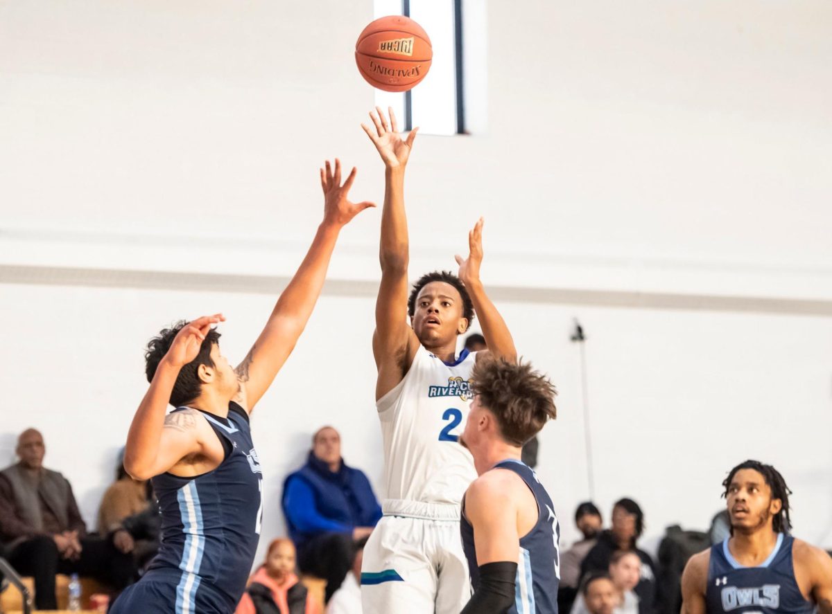 Shooting guard Jeremiah “Scoob” Stroman takes a shot last year in the final season the basketball team played as a Division III team. 