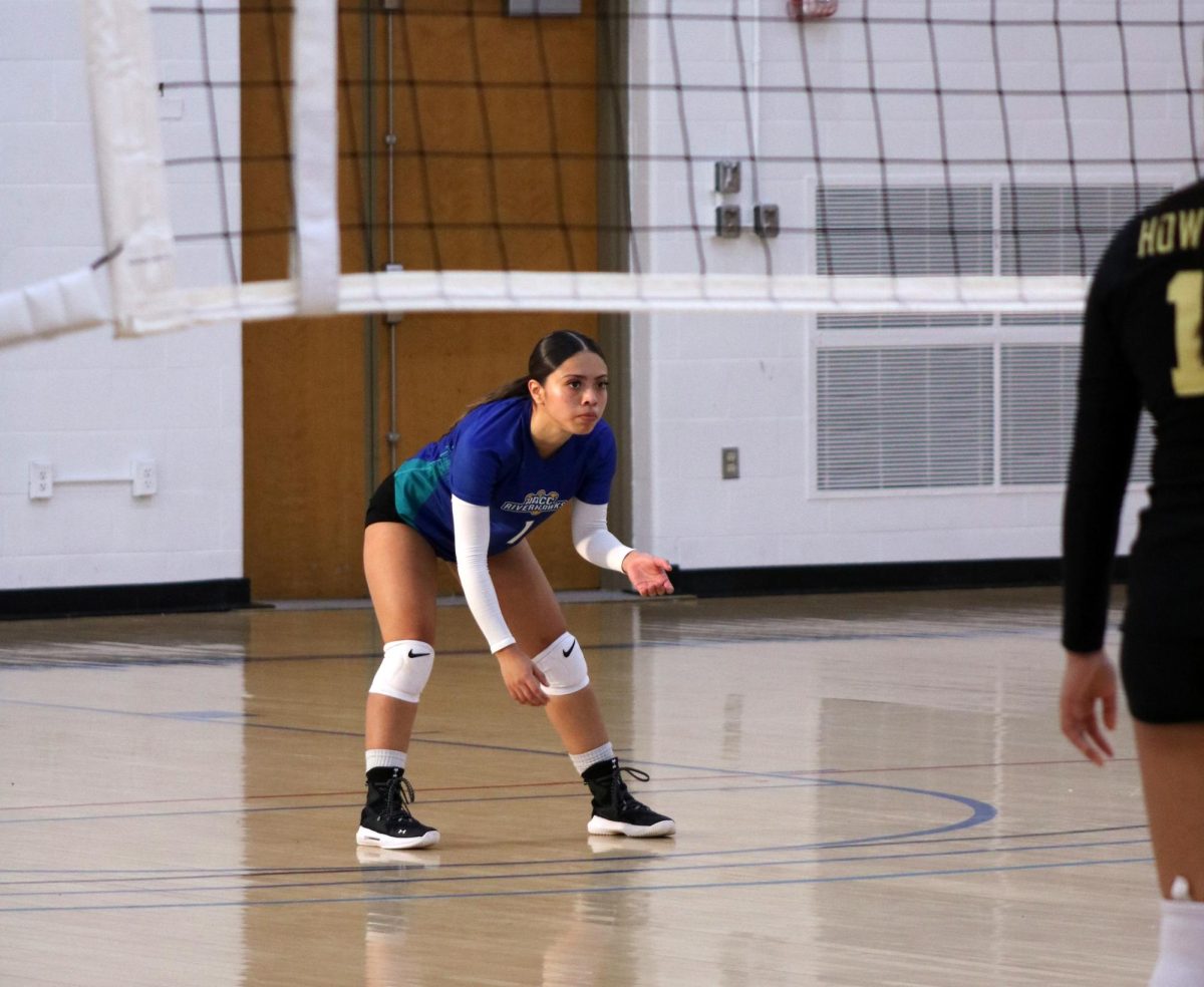 First-year athlete Emily Rodriguez plays her first volleyball home game as a Riverhawk against Howard Community College.
