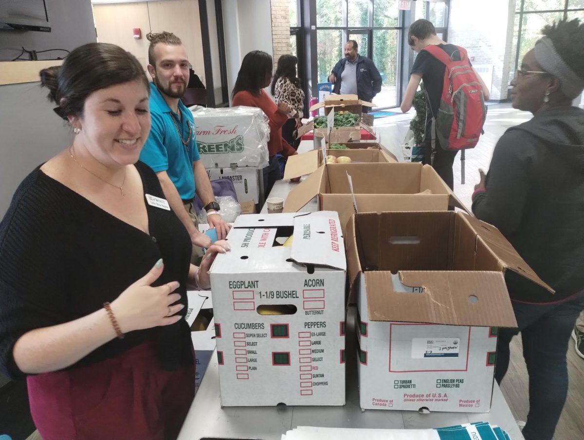 Students get free produce and pedometers at Wellness Wednesday event.