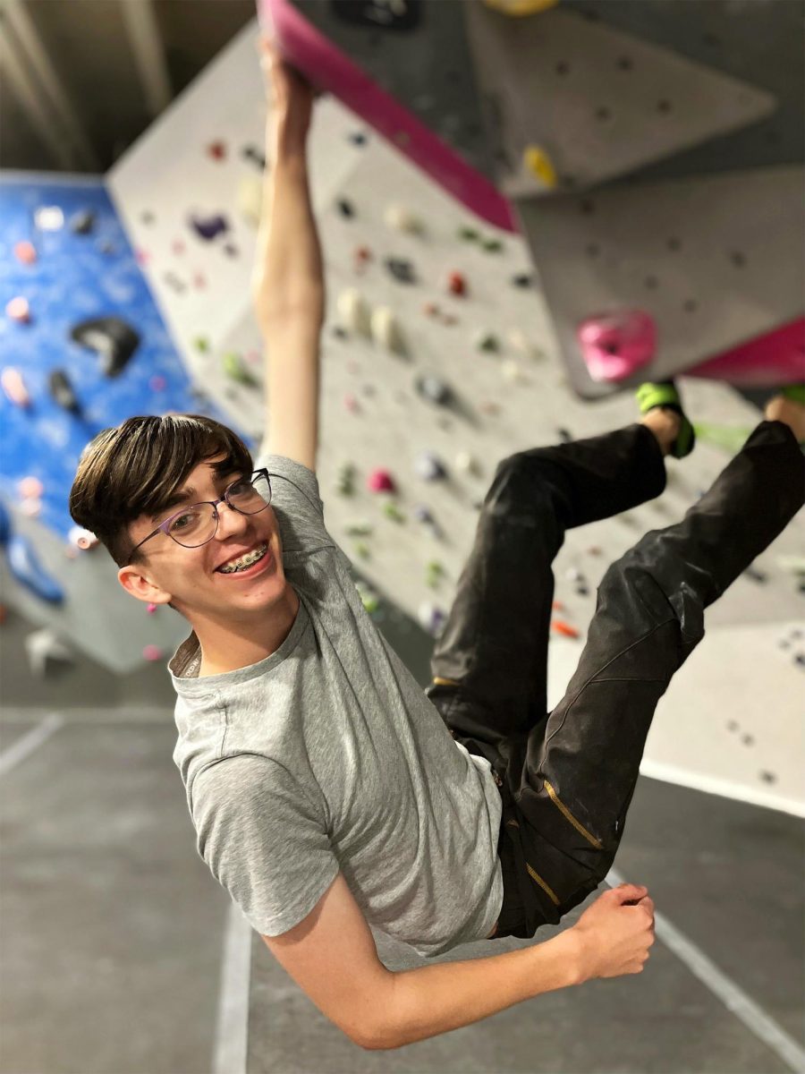 Falling can be scary, but sometimes you have to try something new to climb higher. Shown, Editor-in-
Chief Tomi Brunton rock climbs at a gym. Photo courtesy of David Brunton.