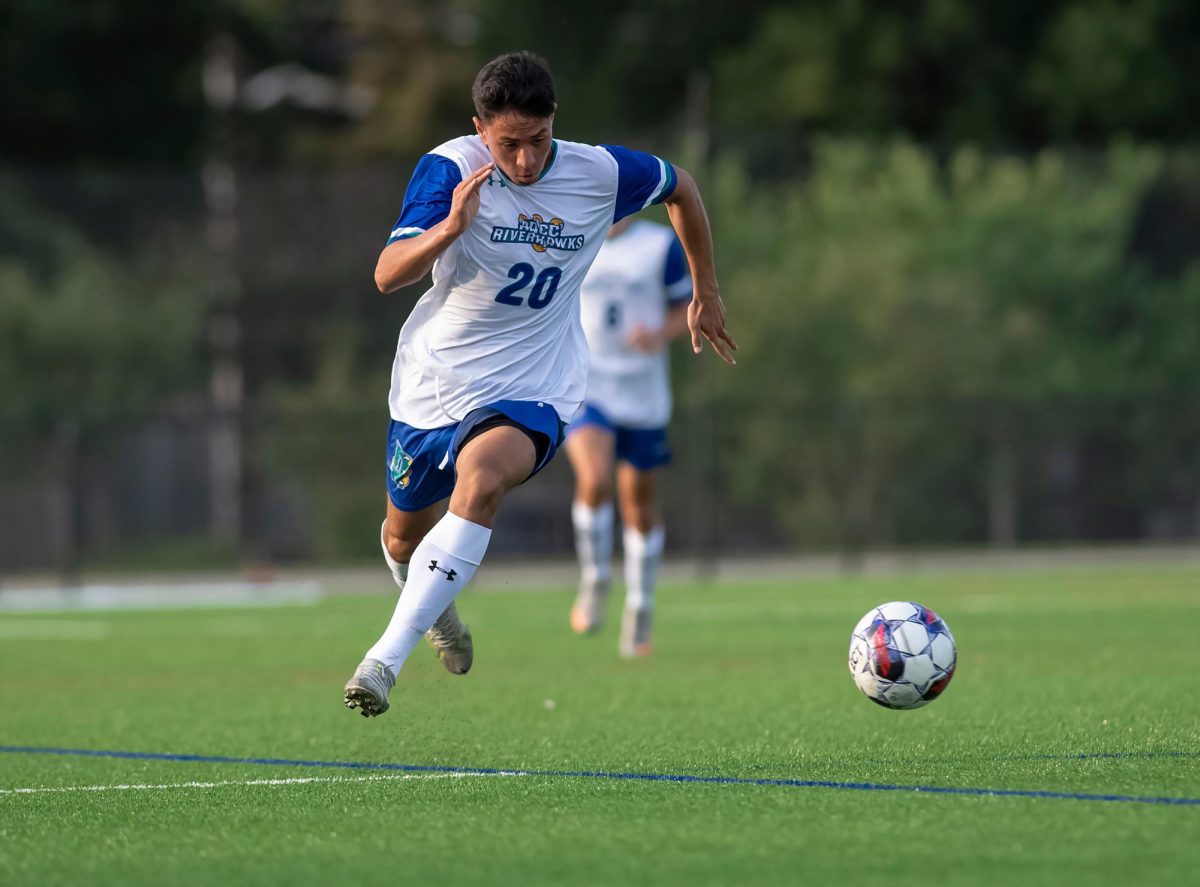 Midfielder Jose Rodriguez, a first-year player, takes the field during a soccer game. The team finished the regular season 3-6-4.
