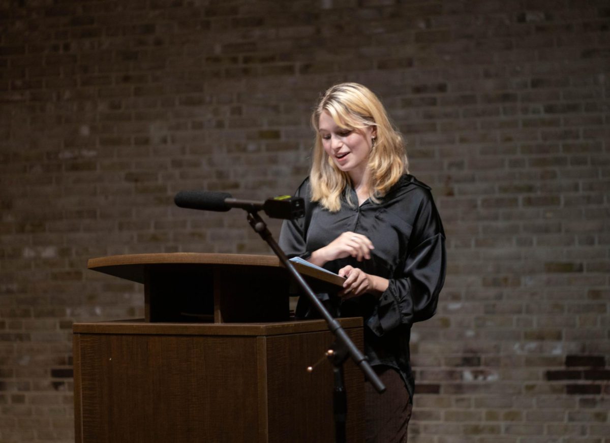 Marissa Falcone, a student from AACCs creative writing program, reads her award-winning poem Green at a Writers Reading Event on Tuesday.