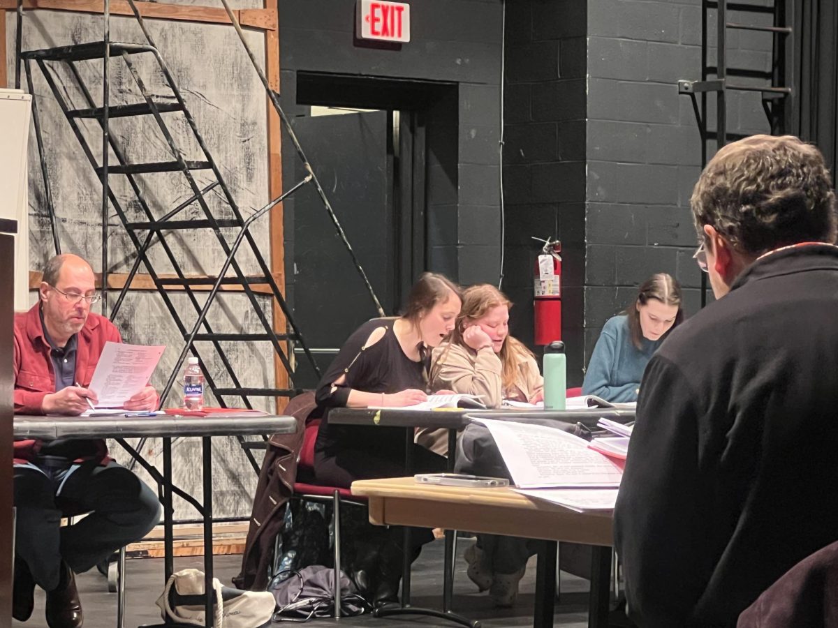 Theatre AACC actors prep for their April performance of “Little Shop of Horrors.”