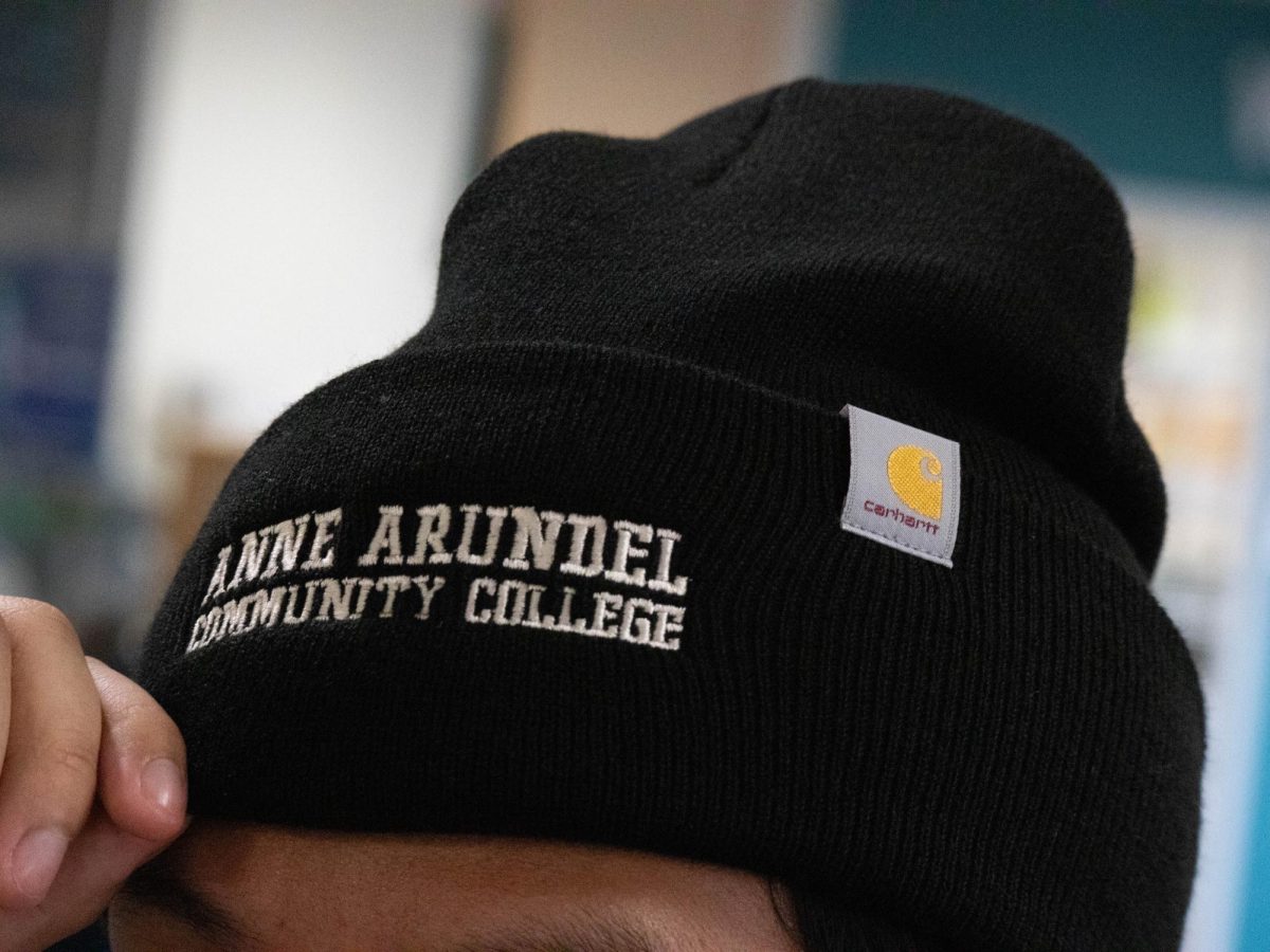 The+campus+bookstore+sells+attire+from+the+casual+wear+line+Carhartt.+Shown%2C+second-year+homeland+security+student+Philip+Michaels+in+a+Carhartt-brand+hat.%0A