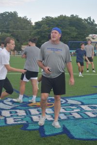 New soccer head coach Drew Belcher holds a pre-season practice on campus.