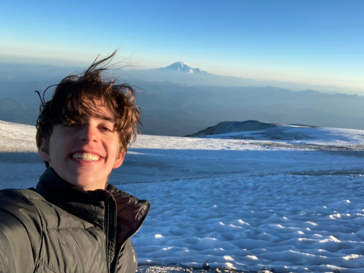 Former Campus Current Editor-in-Chief Tomi Brunton summits Mount Adams.